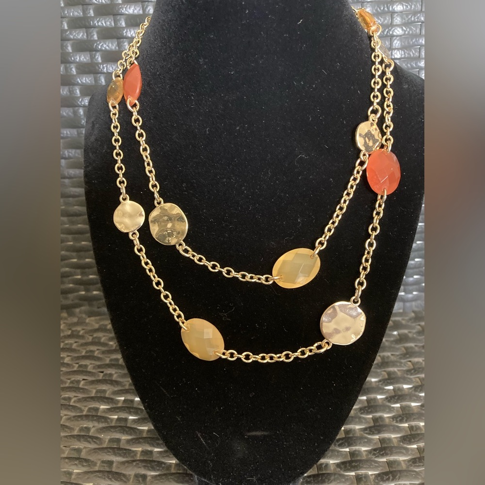 Beaded multicolored and gold-toned long necklace.